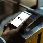 Close-up-view-of-man-using-Apple-Pay